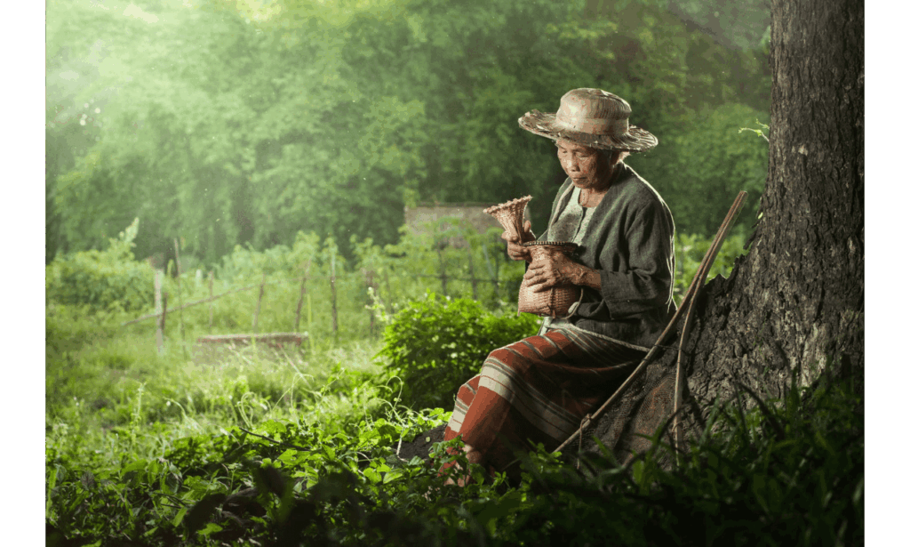 Asian grandmother fisherman with the net